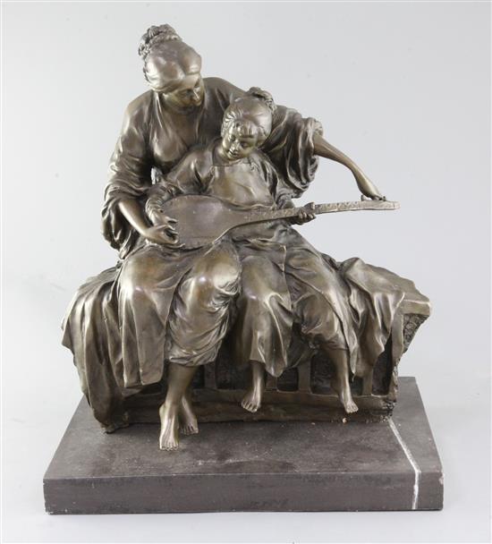 Milo. A bronze group of a mother and child playing a mandolin, height 17.5in.